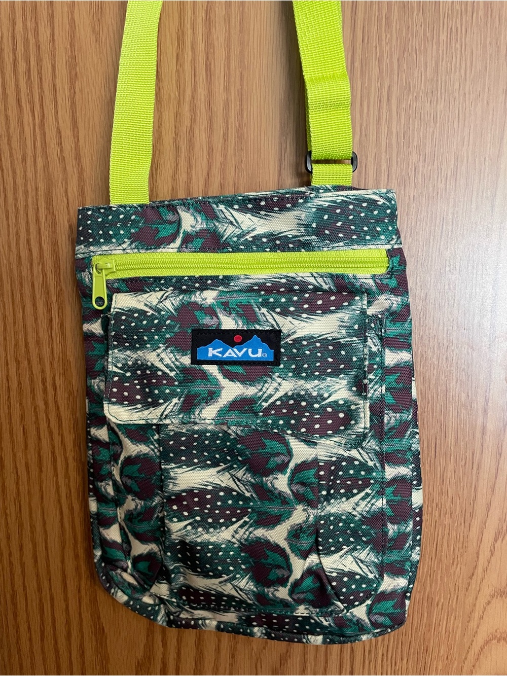 Kavu Feather Printed Crossbody Bag with Neon Yellow Strap